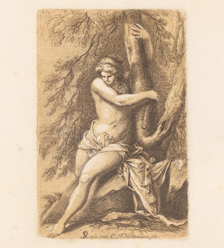 Half-naked woman holding onto a tree
