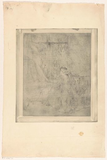 Woman sitting on a chair next to a cradle