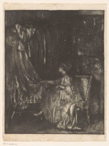 Woman sitting on a chair next to a cradle