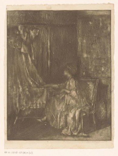 Woman sitting on a chair next to a cradle