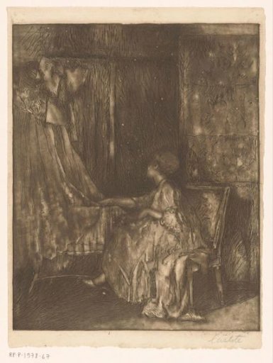 Woman sitting on a chair next to a cradle