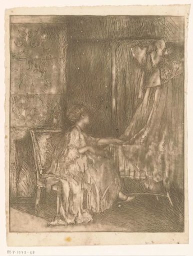 Woman sitting on a chair next to a cradle