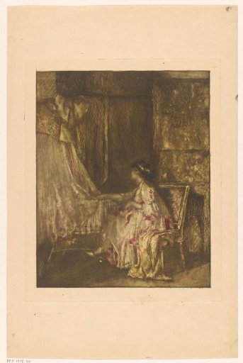 Woman sitting on a chair next to a cradle