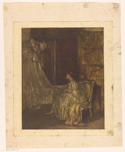 Woman sitting on a chair next to a cradle