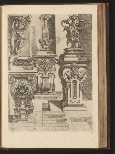 Three Composite pedestals decorated with ram's heads, mascarons, and volutes, with vases on top, and a console with a herm