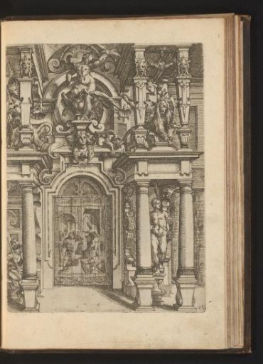 Portal with a tapestry for the passage and, at the top, Zeus on an eagle flanked by women on lions