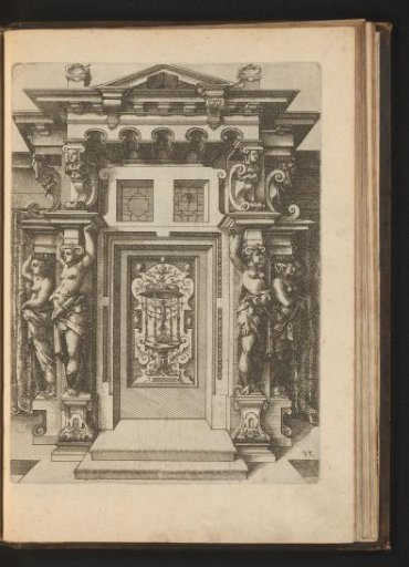 Portal flanked by four caryatids next to the door with grotesque flat decorations