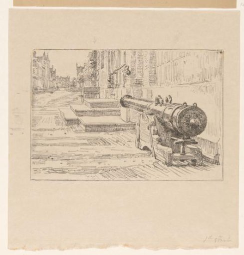 Street in Enkhuizen with an old cannon