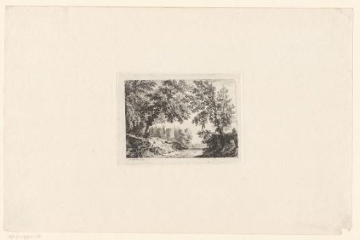 Seated man by a country road