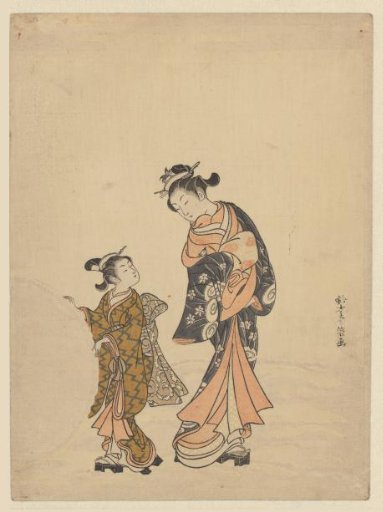 Young woman and girl with a snowball