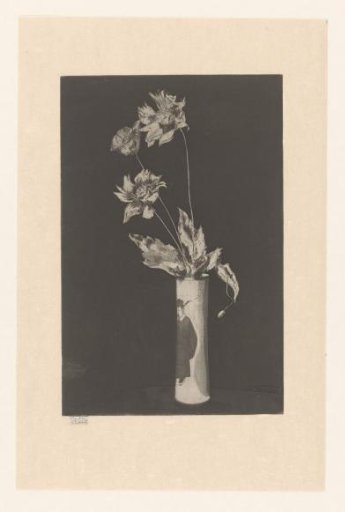 Flowers in a vase with Chinese motifs