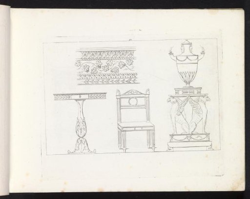 Ornamental border, a table, a chair and a lamp