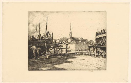 Boatbuilders at the quay of the harbour in Concarneau