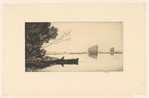 Rowing boat on the edge of a lake