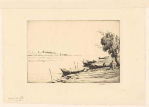 Boats along the bank of a river
