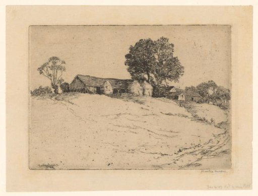 Farmhouse on a hill with haystacks