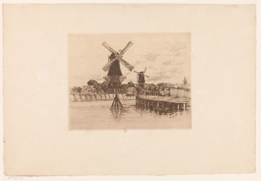 View of three windmills by the water in Rotterdam
