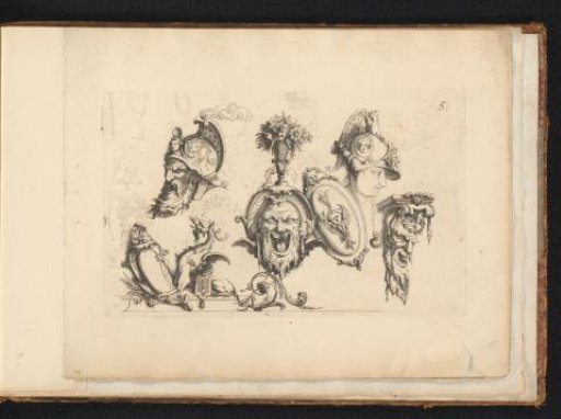 Ornaments with masks and a fantasy creature