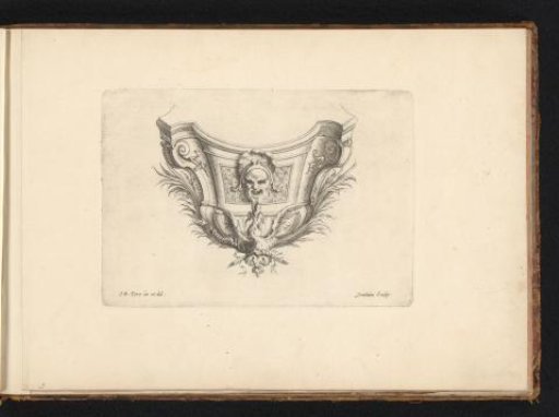 Ornament with a mask and a phoenix