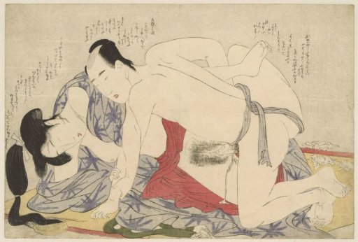 Newly married couple making love on a summer sleeping mat