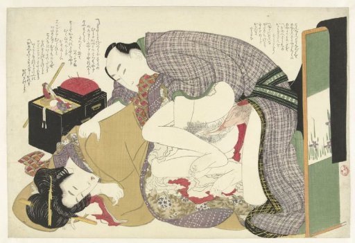 Lovers by a sewing box