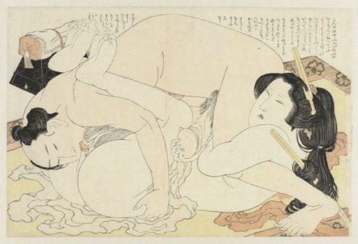 Man and woman making love on a carpet