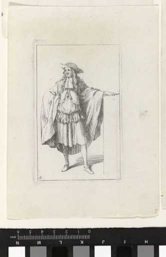 Man by a wall, dressed in a rhingrave costume and a wide cloak