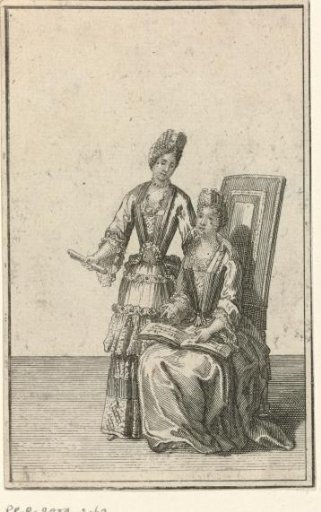 Standing and Seated Woman Dressed in a Mantle