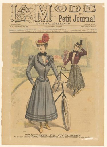 Two women with their bicycles in a park