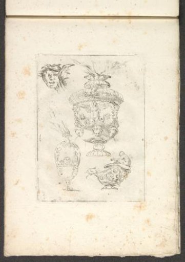 Ornamental head, two vases, and a jug