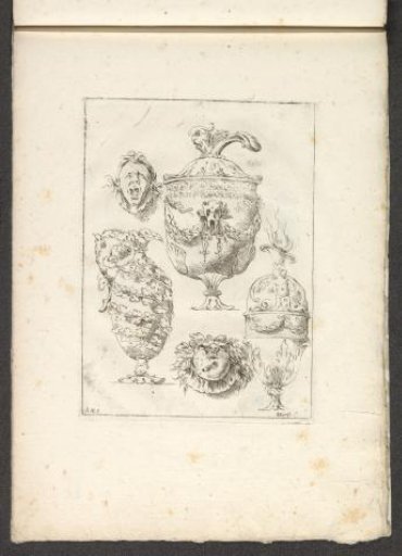 Two ornamental heads and three vases