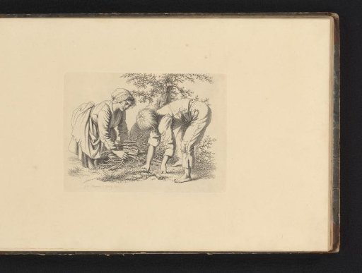 Woman and boy gathering firewood