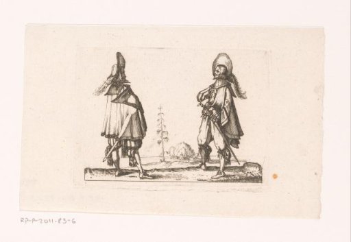 Two officers with a view of an estate