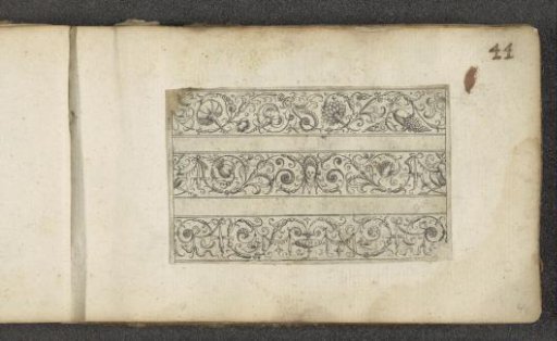 Three friezes with fruit, a mask, and a vase