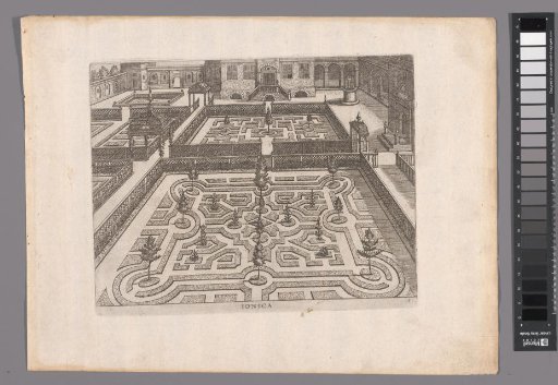 Garden with two parterres and the façade of a house