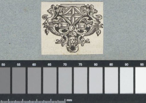Ornament with jewels and mask
