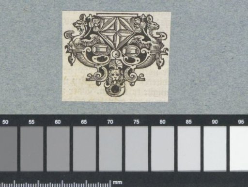 Ornament with jewels and mask