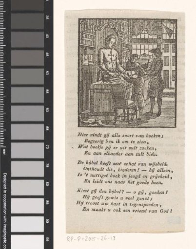 Boy paying for a book in a bookshop