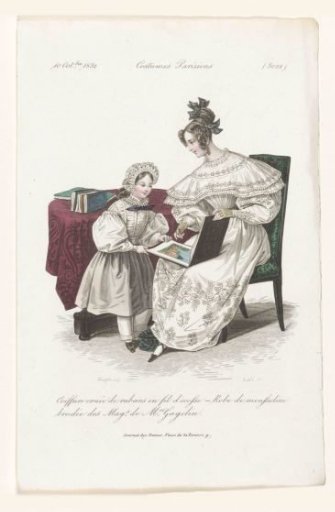 Woman and girl viewing an album together