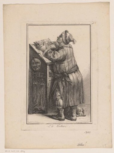 Man reading behind a lectern