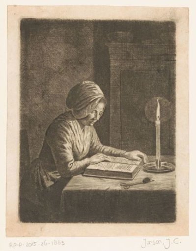 Dark room with a reading woman