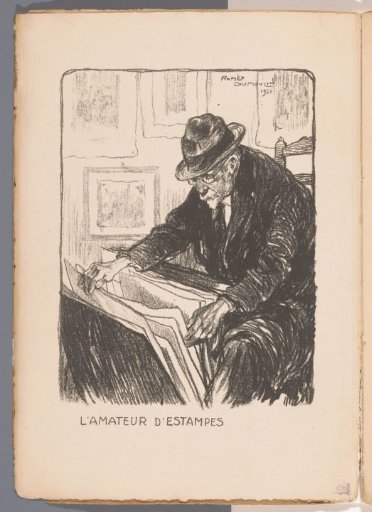 Man on a chair viewing a map with prints