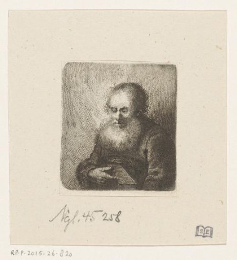 Bearded old man with a book in his hand