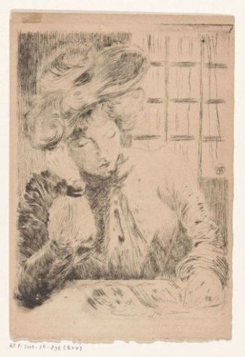 Woman reading behind a table