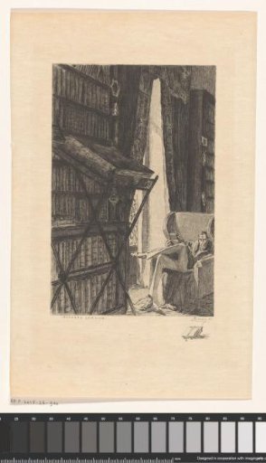 Man in a chair in a library