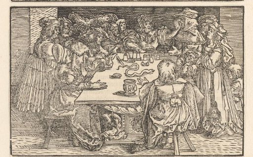 Magician entertaining his audience at a table