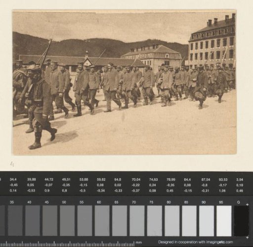 The Germans make an attack to retake the famous summit of the Hartmannswillerkopf (...) losing 1,600 prisoners of war who are seen here parading through a village in French Lorraine