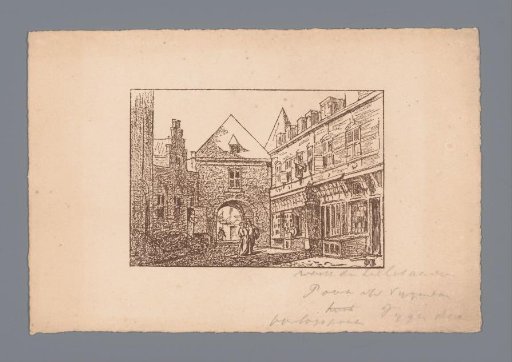 City view with shops and a gate