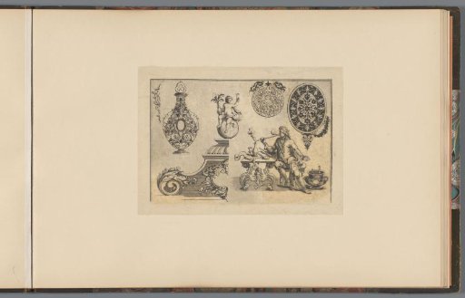 Smoking man at a table surrounded by ornamental designs