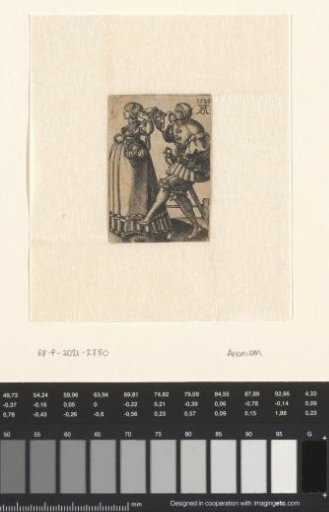 Dancing couple with arms raised